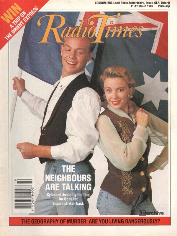 Front cover of Radio Times magazine featuring Kylie Minogue and Jason Donovan waving an Australian flag.